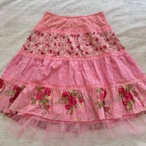 Pink floral and lace multi-tiered skirt from Candies
Size XL in youth size
